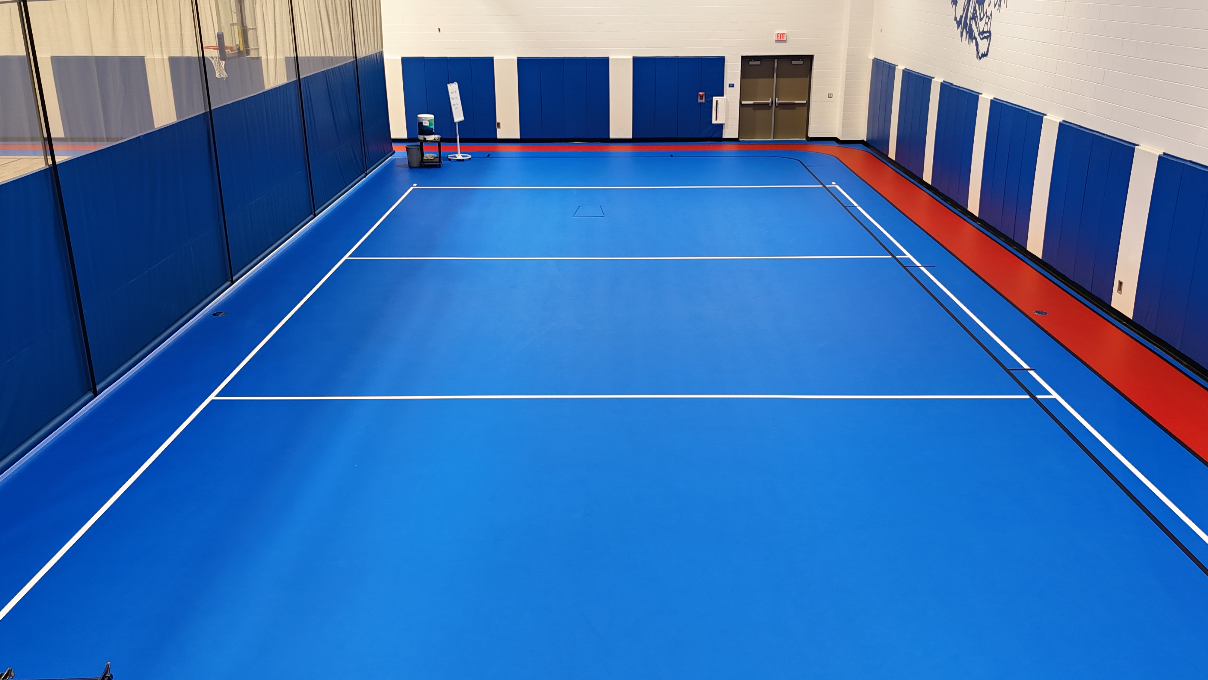 Badin High School synthetic green and black flooring. 