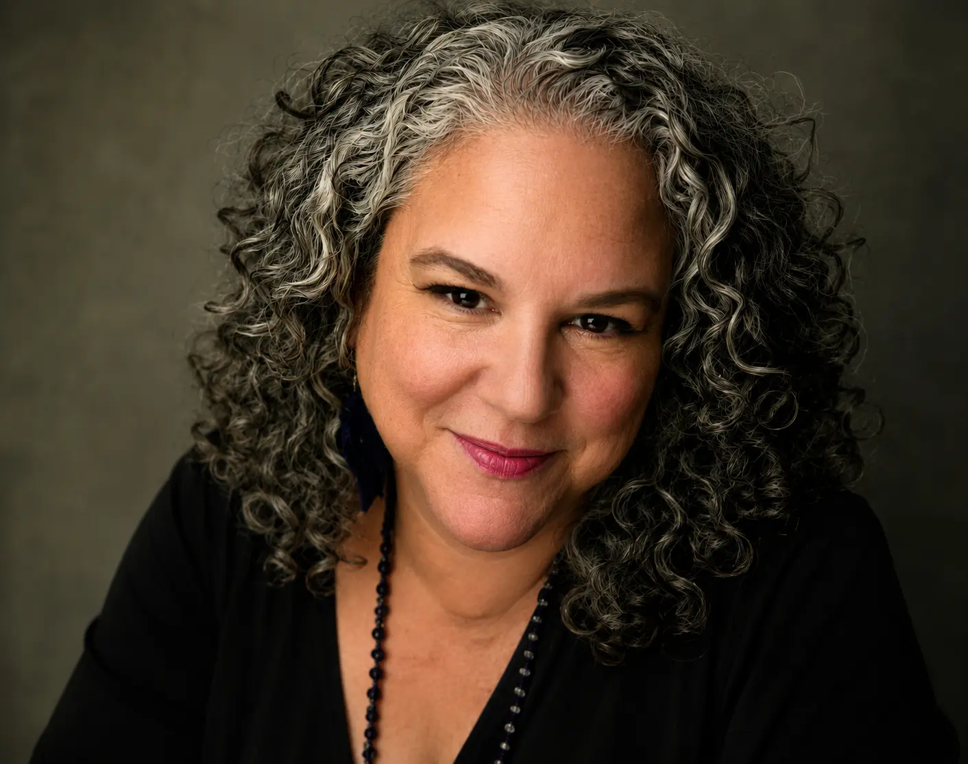Portrait of Michele Slobin, Founder and Creative Director of Gryphon Design Strategy. Represents decades of experience helping startups and enterprise organizations develop brands, websites, and customer experiences.