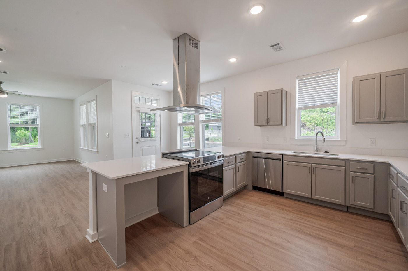 Kitchen view of a nearly completed apartment complex.