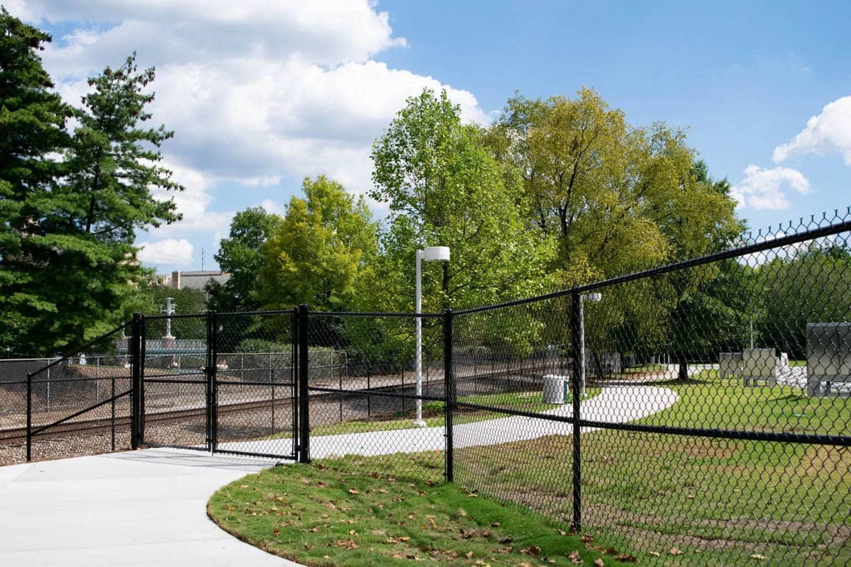 Commercial security gate and perimeter fencing installed by Loudon County Fence in East Tennessee.