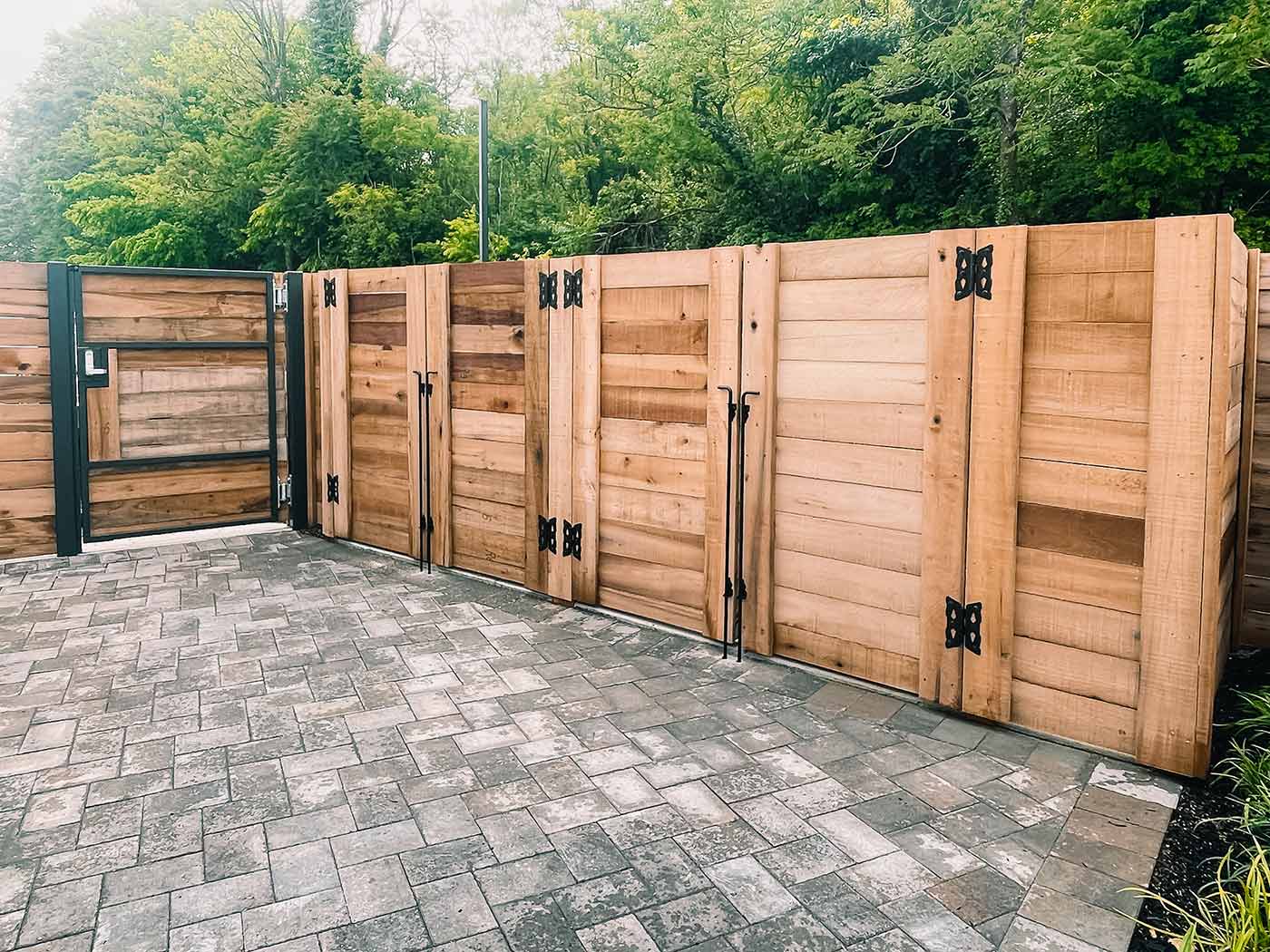 Wood privacy fence along a property line between two homes in East Tennessee