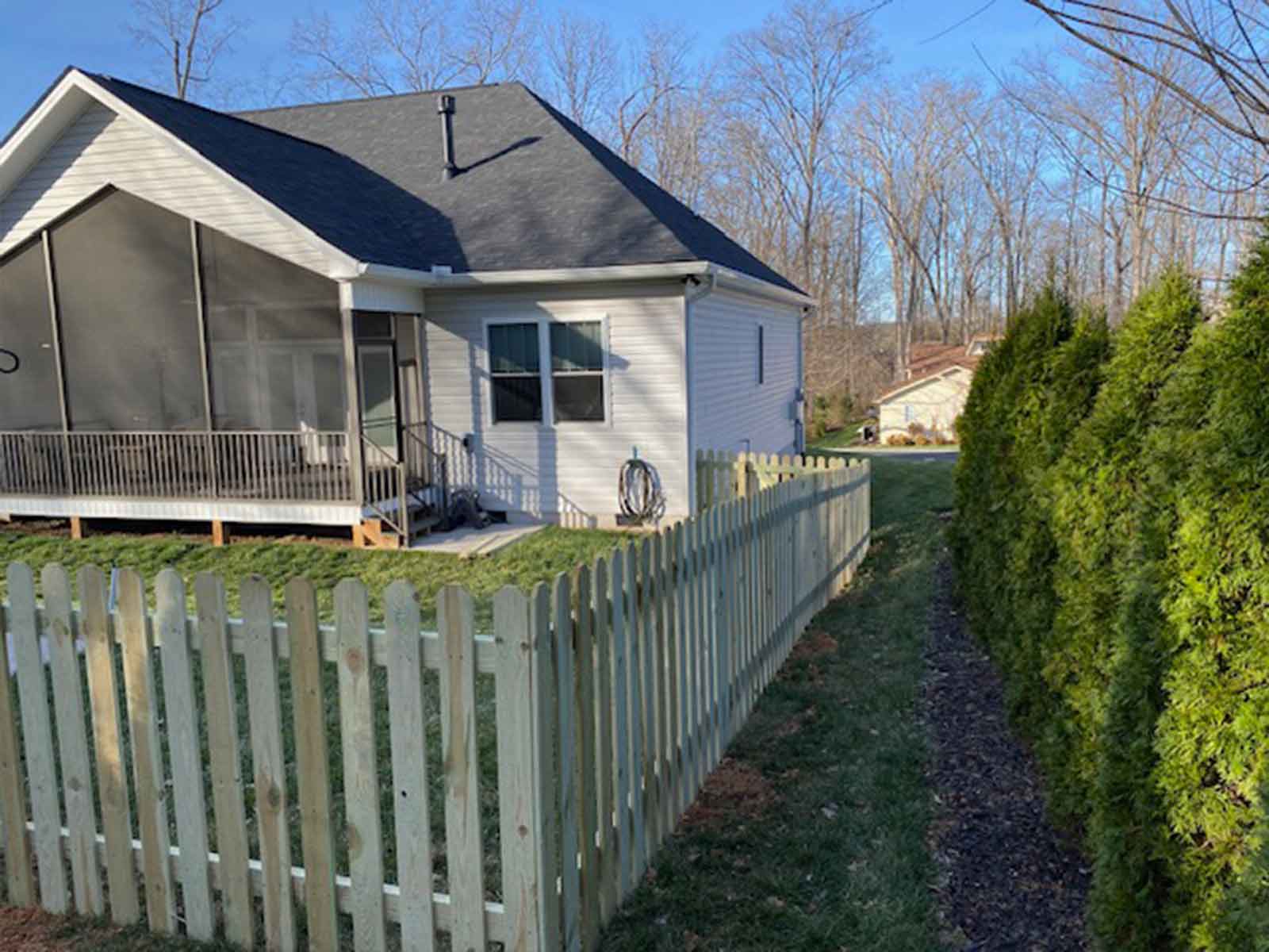 Dog ear wood picket fence installed in East Tennessee