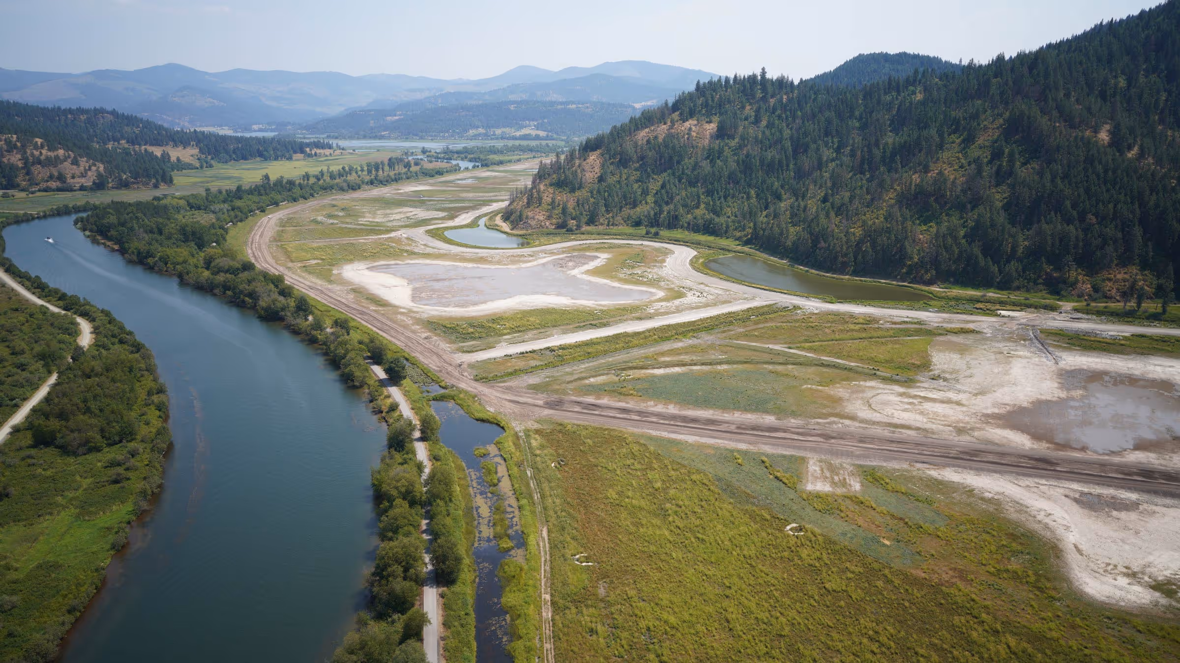 Environmental rehabilitation work near river system.