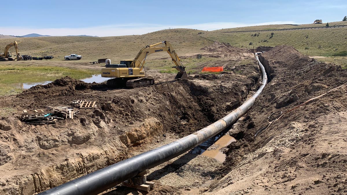 Excavators working on a pipeline project.