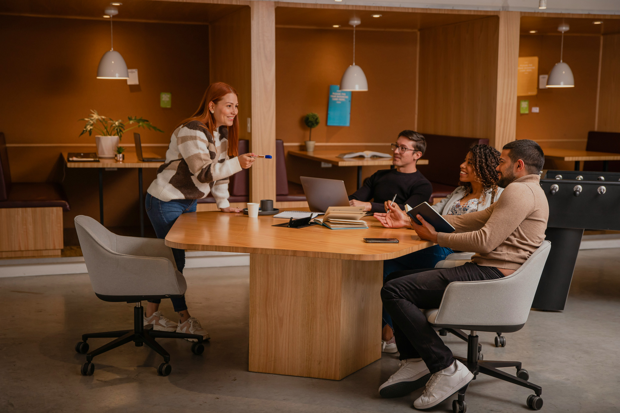 Group working together at a desk in a office