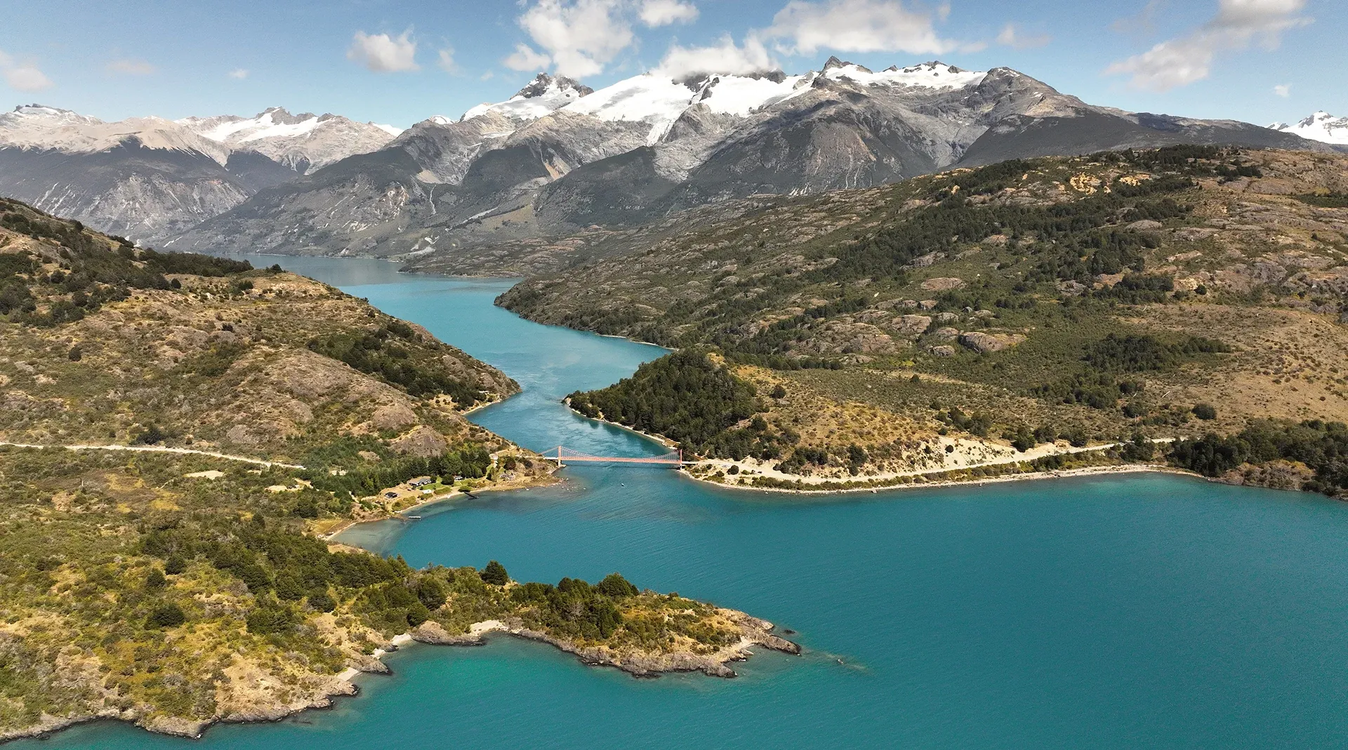 Turquoise lake and Andean peaks along the Carretera Austral in Chilean Patagonia, a setting for executive retreats