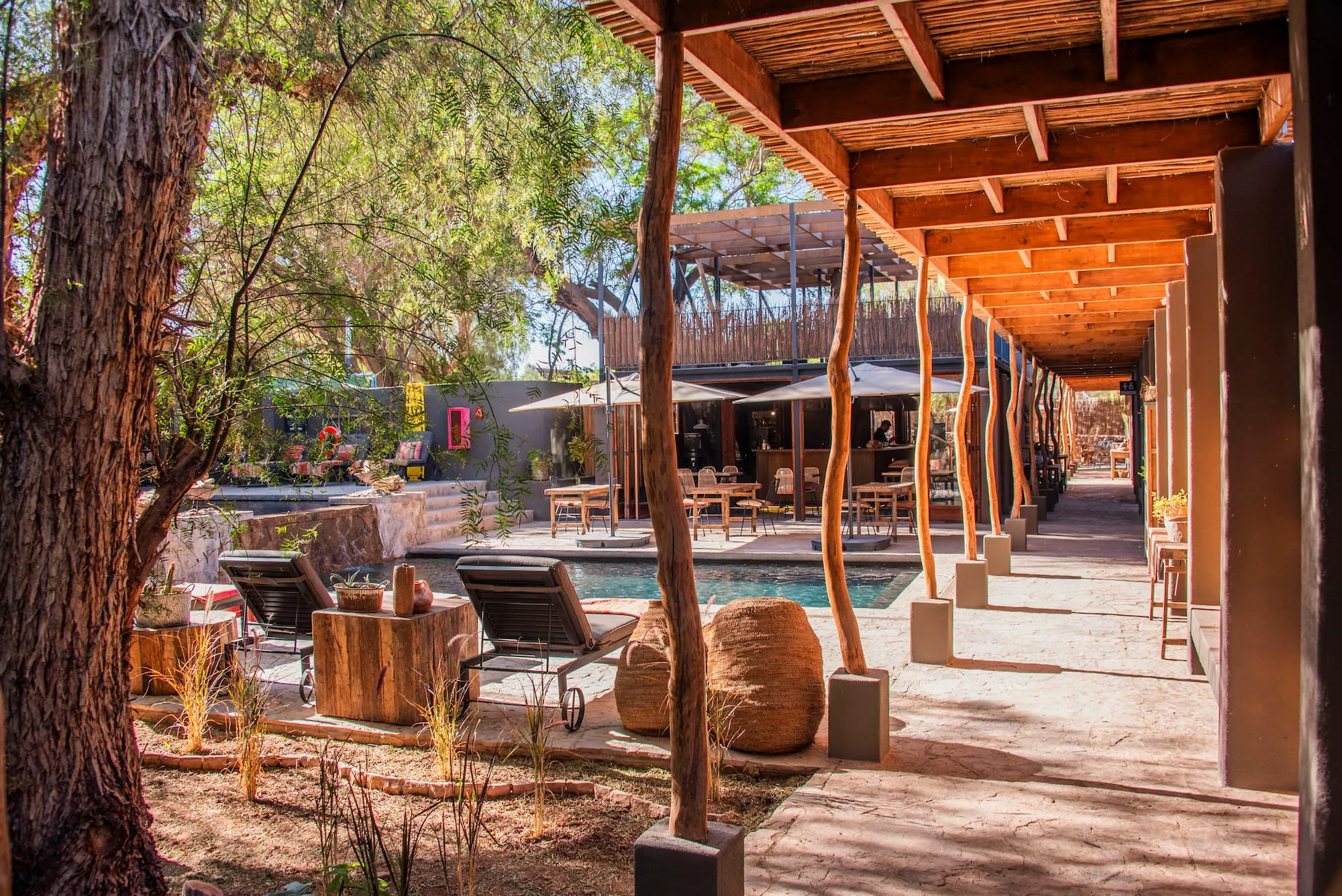 Shaded terrace and common spaces of a small private lodge in the Atacama Desert, Chile