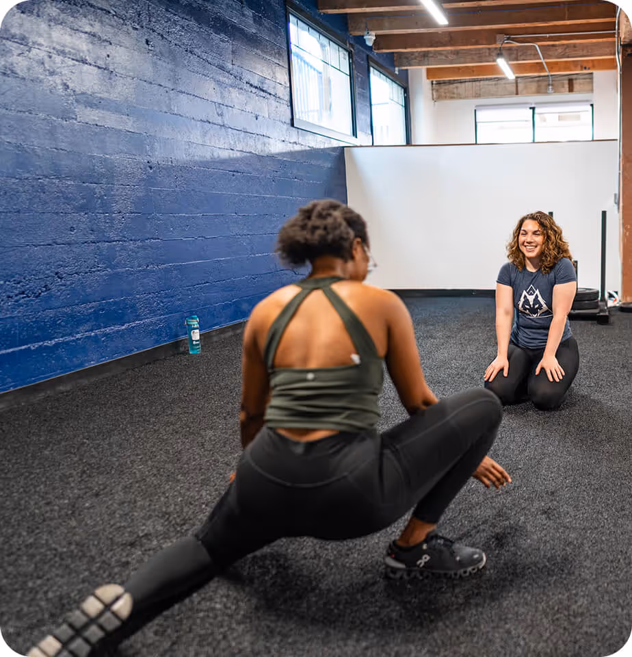 paulina assessing patient stretching - performing arts pt services