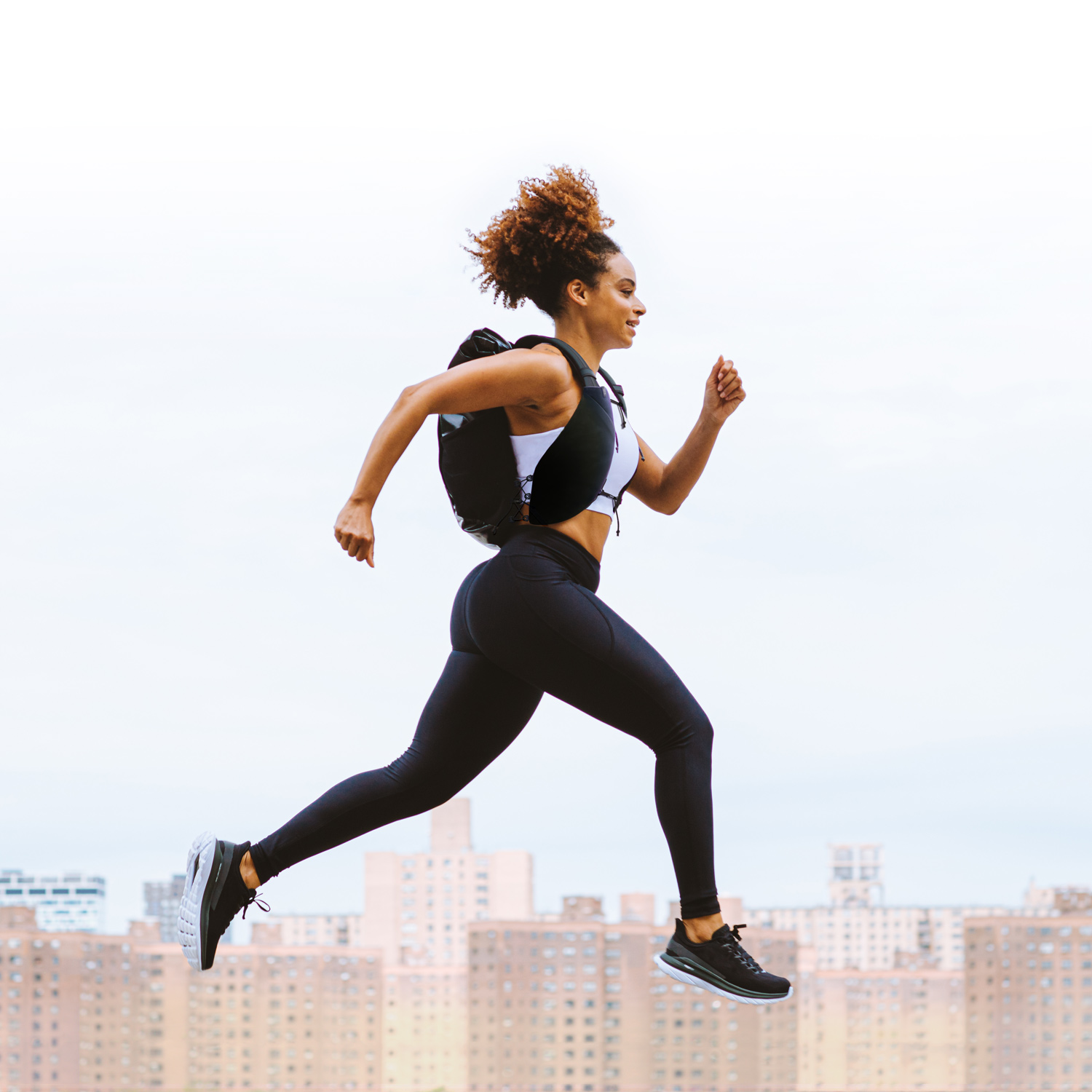 a runner with a run commute backpack