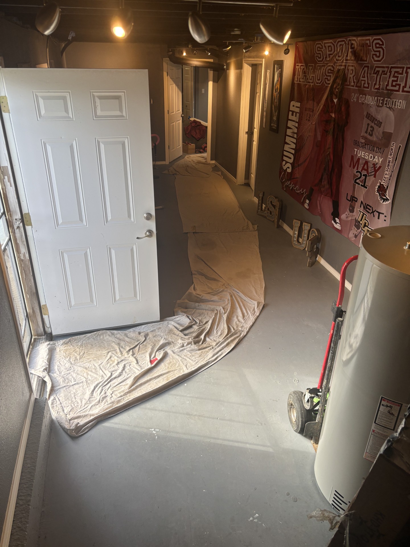 plumber fixing water leak damage