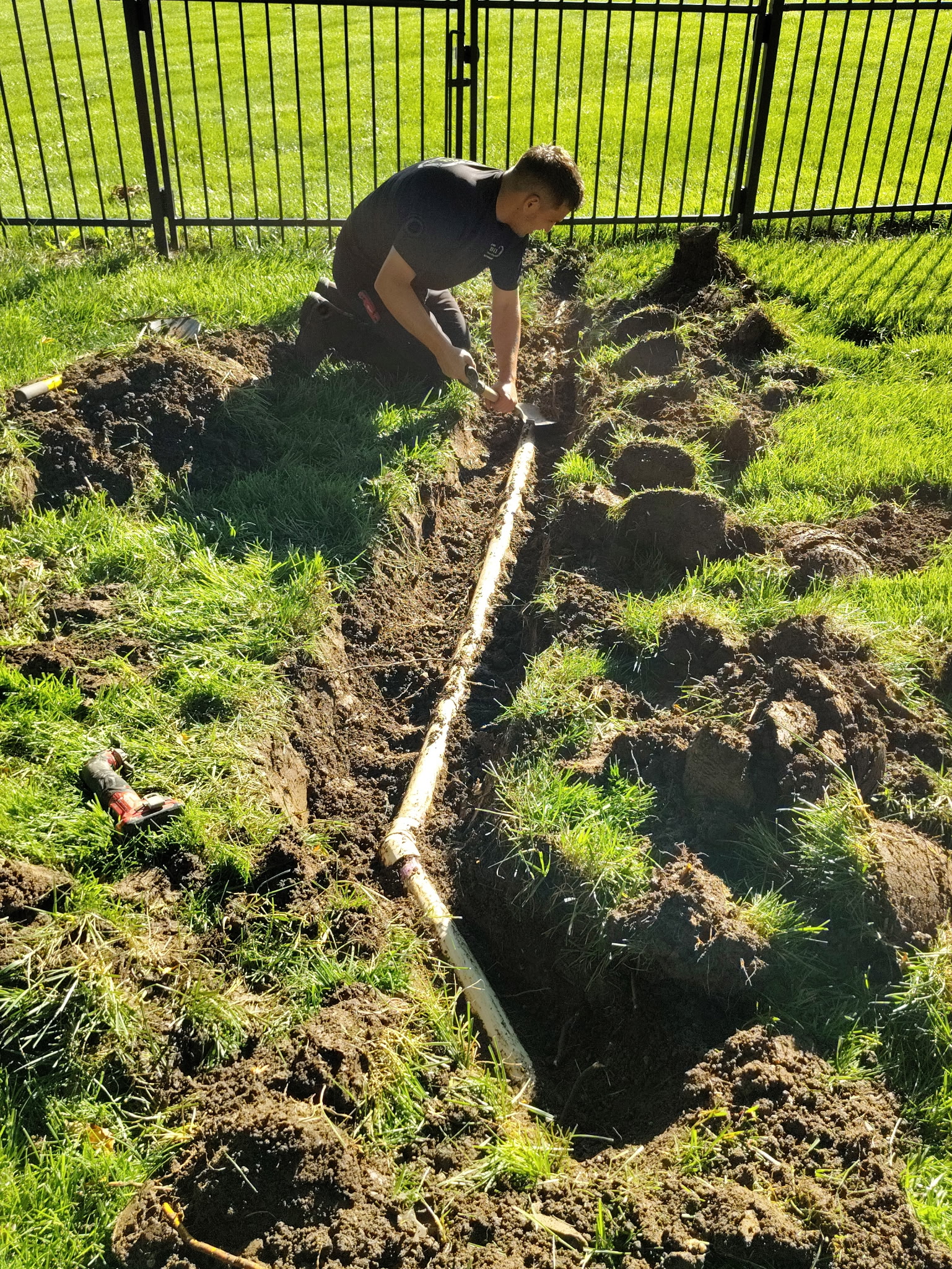 plumber fixing a sewer