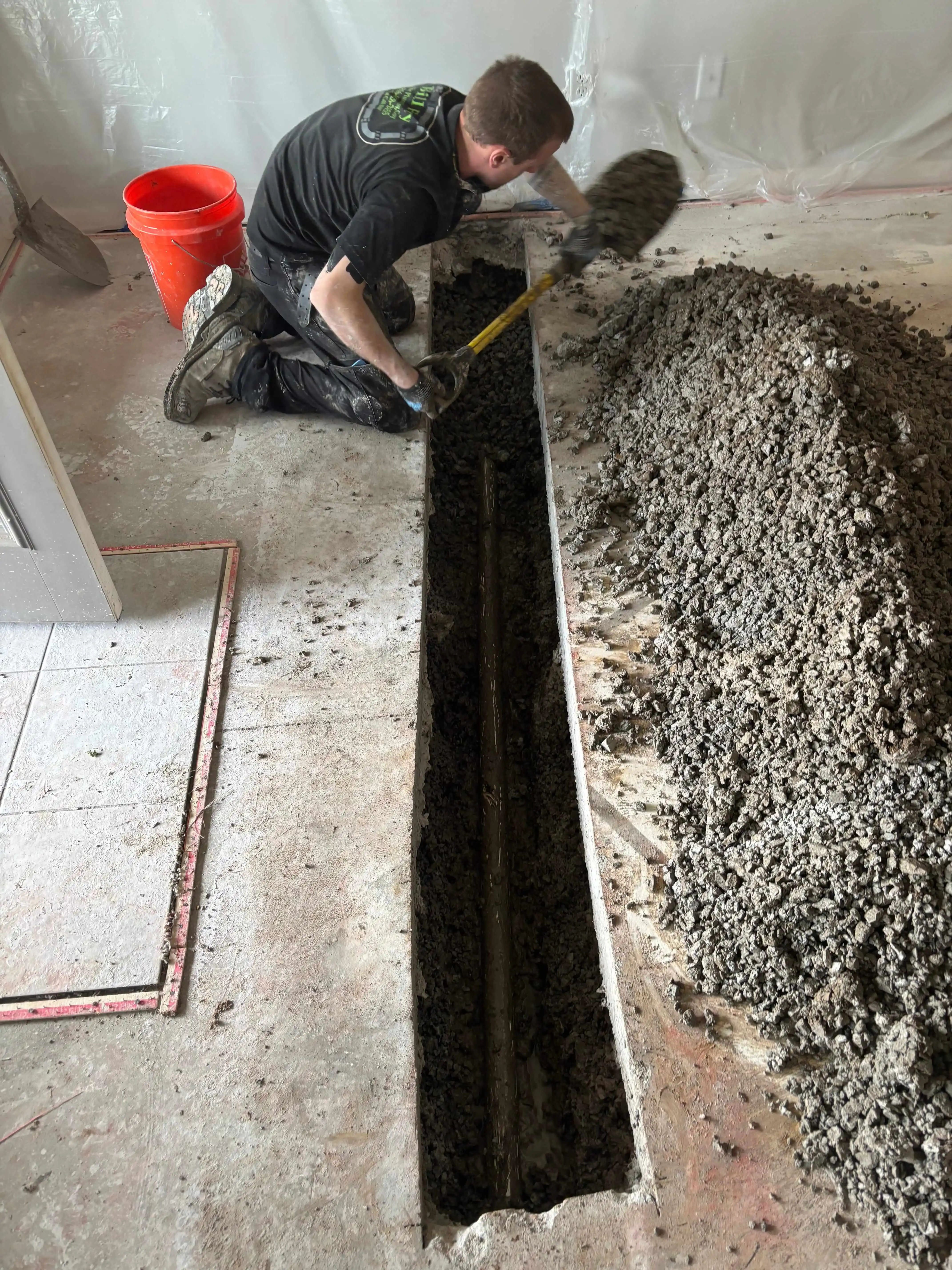 plumber excavating a sewer