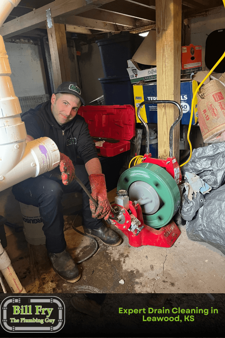 plumber cleaning out a drain