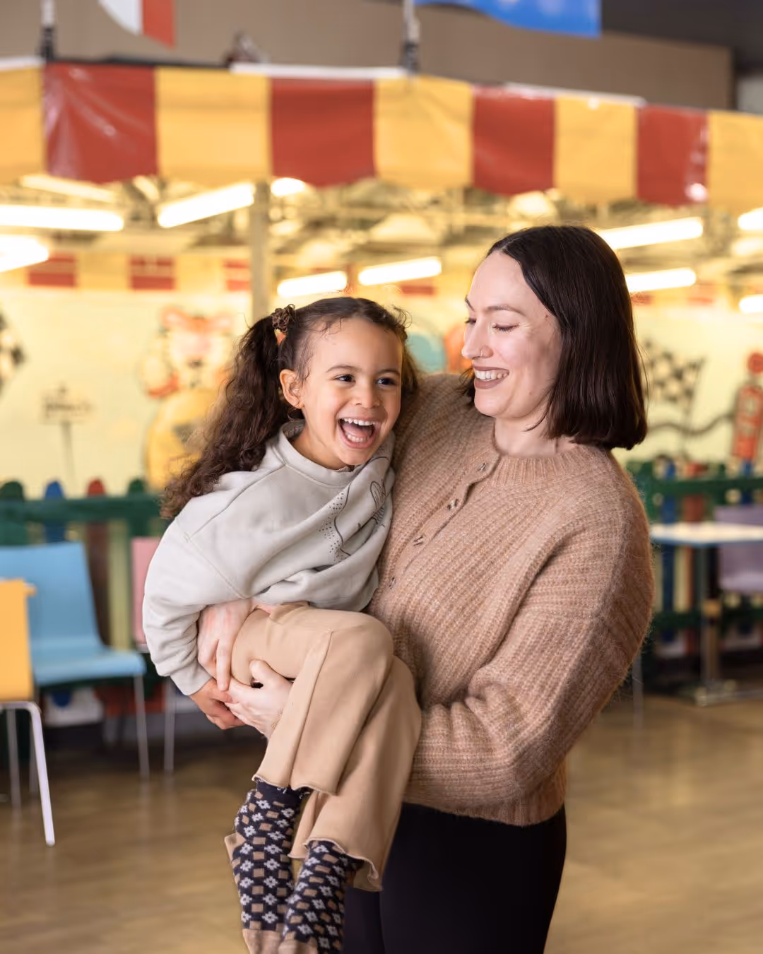 Muma nd daughter in front of dodgems