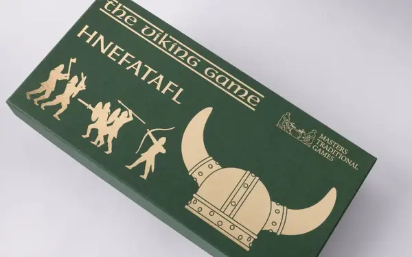 Green box for the Viking game with gold Viking helmet and warrior silhouettes.