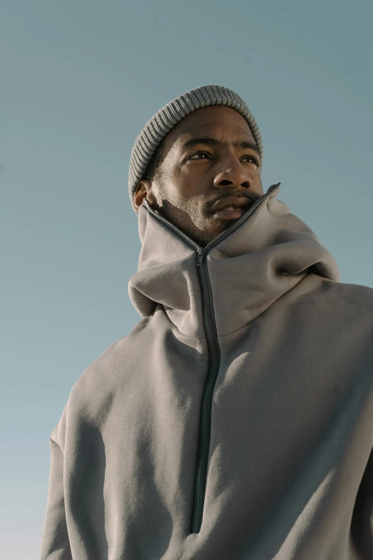 Close-up of Sinners winter collection gray puffy jacket details