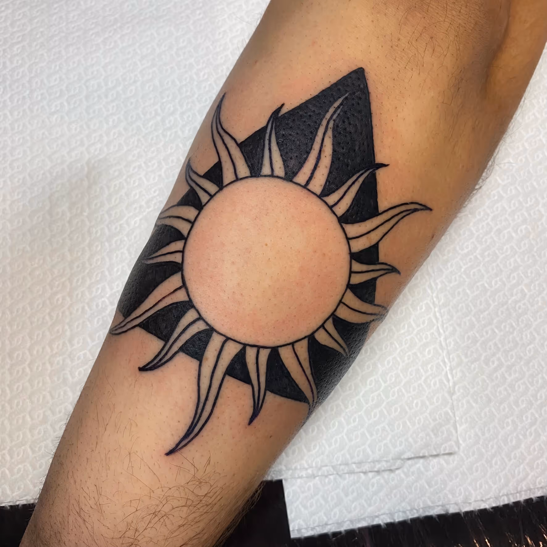 Sun and triangle