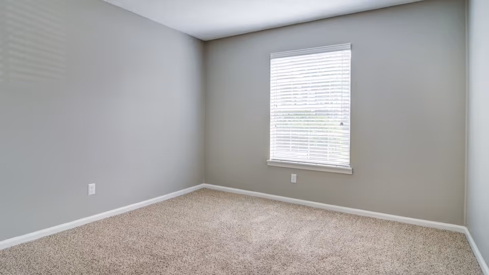 Bedroom with walk-in closet at The Benton