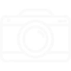 A simple white icon of a camera on a transparent background