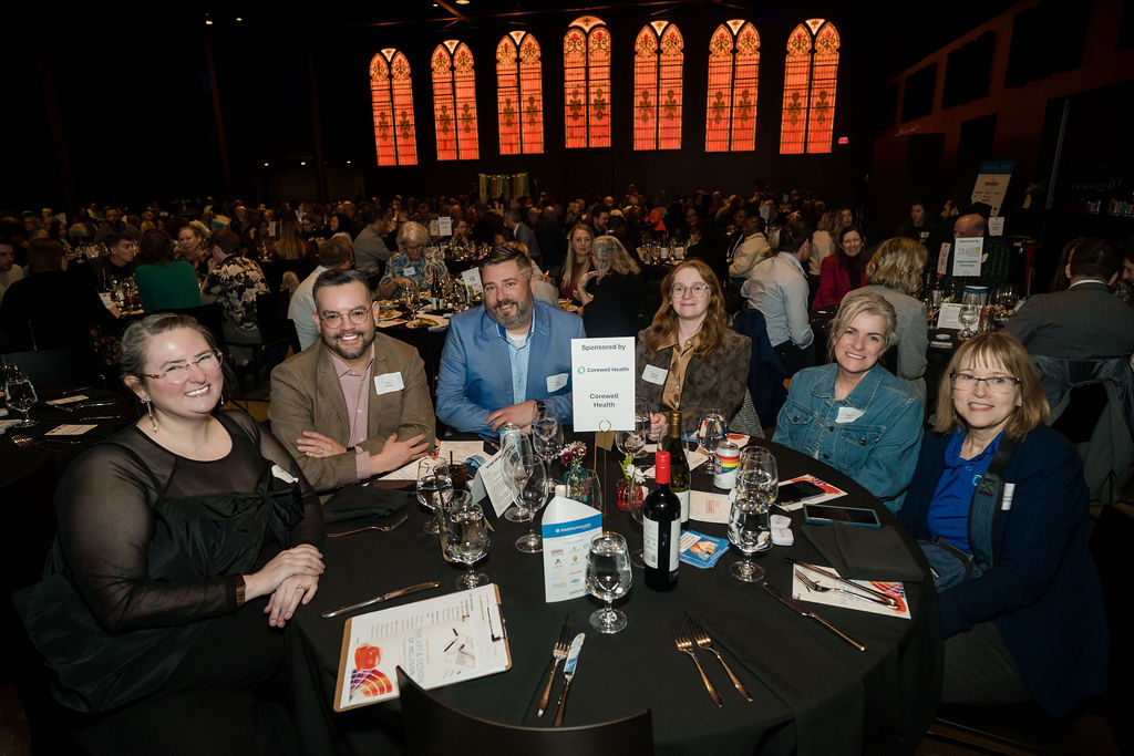 group shot of guests seated around a table