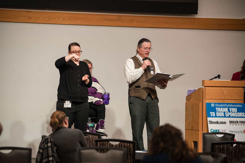 dave introducing keynote speaker on stage