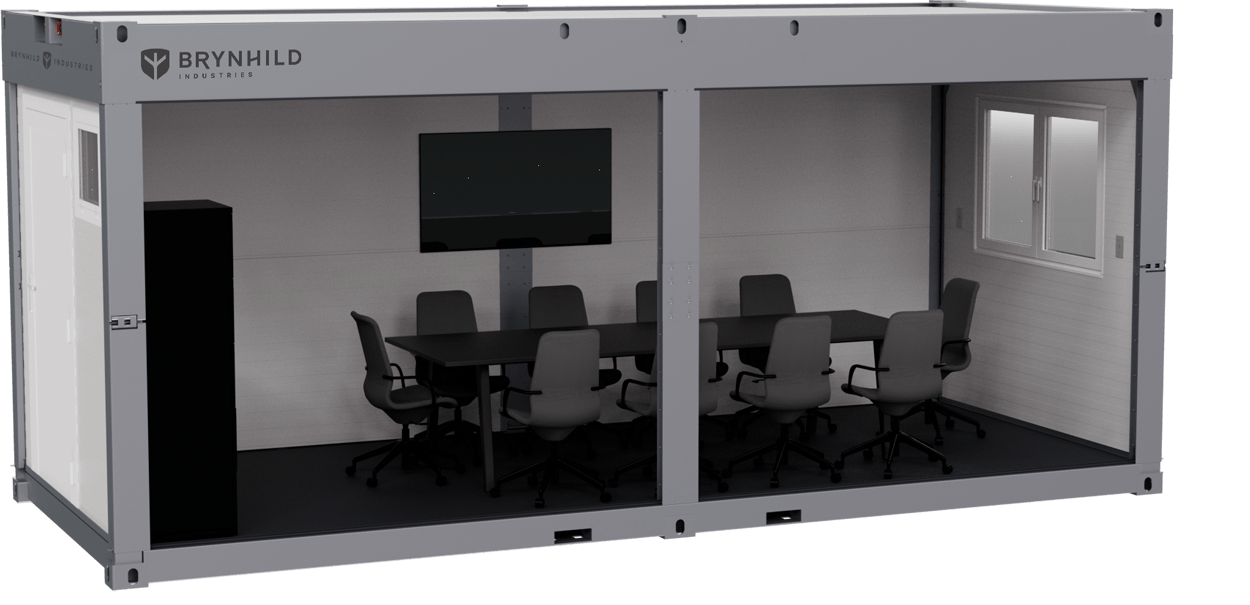 The Svallin XX with a boardroom table, office chairs, TV, and filing storage adapted for use as a portable office. 