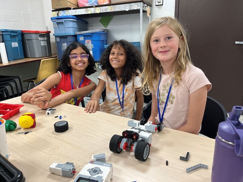 Middle school students having discussion in a fancy school building at Antheian School in Danville Bay Araa