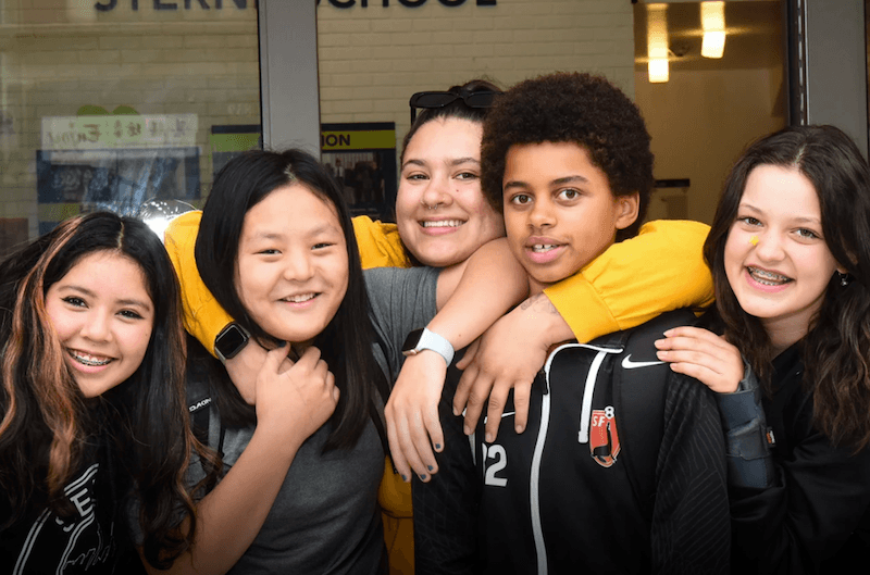 A group of students gathered outside a building of Lick-Wilmerding High School in SF Bay Area