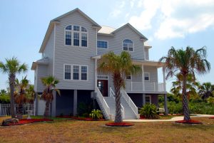 Outside view of home with different types of grid windows