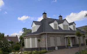 A luxury home with storm panels