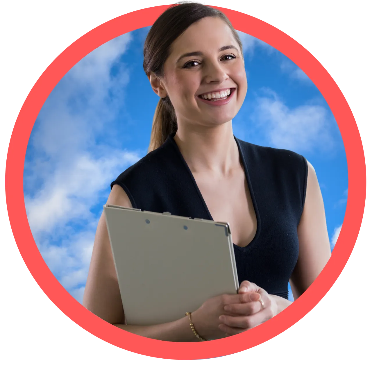 Smiling woman with dark hair in a ponytail wearing a sleeveless black top, holding a clipboard.