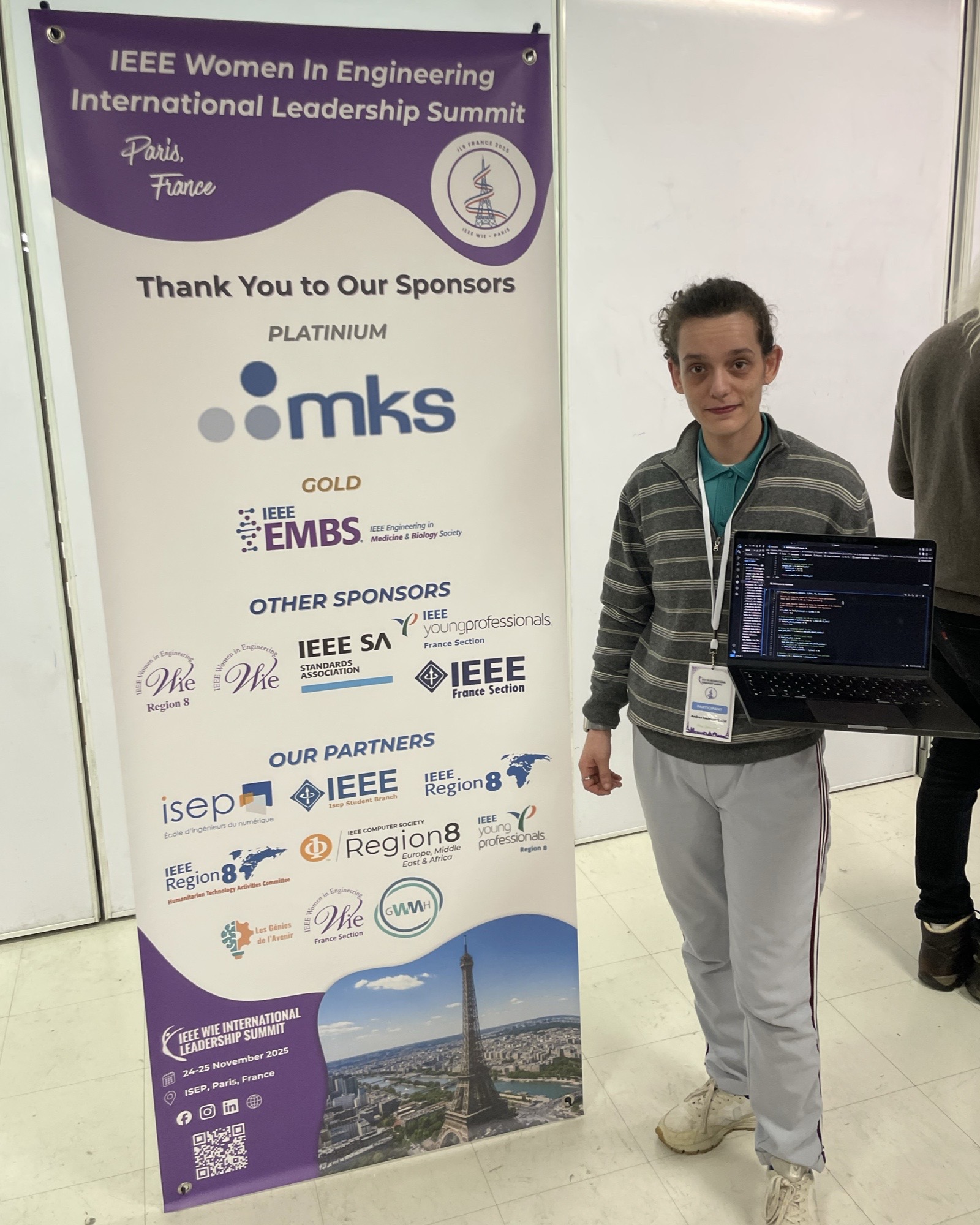 Andrea with FPS poster at IEEE summit