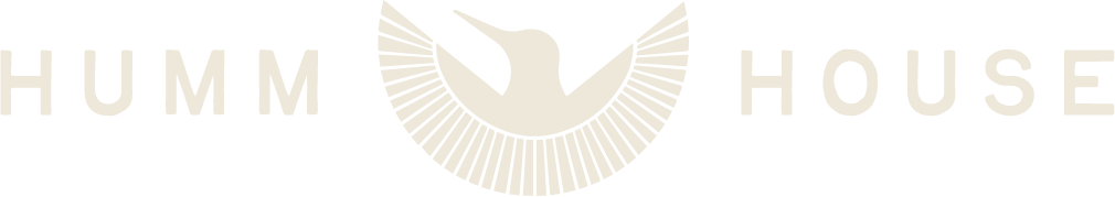 Humm House logo featuring a stylized hummingbird graphic between the words 'HUMM' and 'HOUSE'.