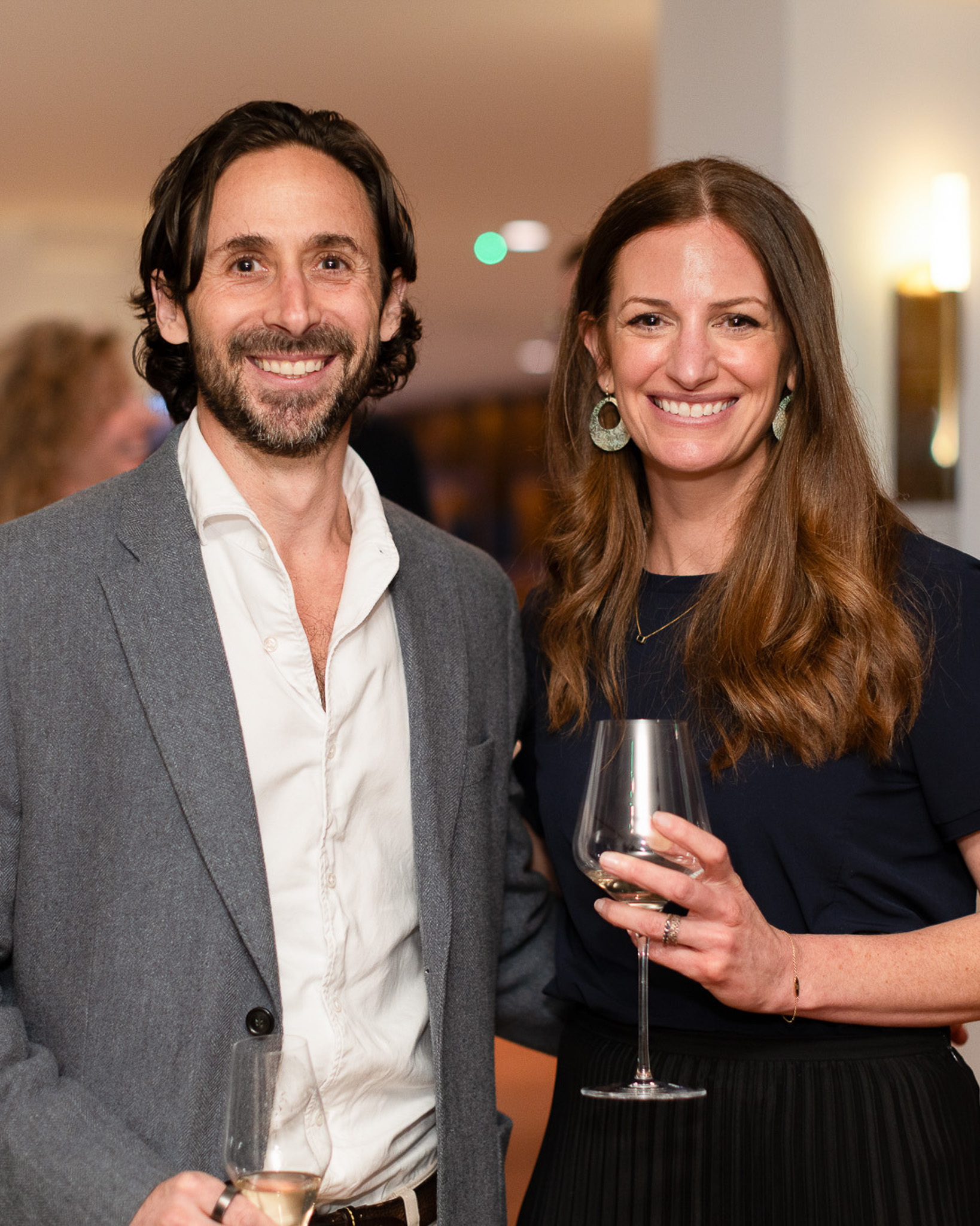 A man and a woman smiling for a picture