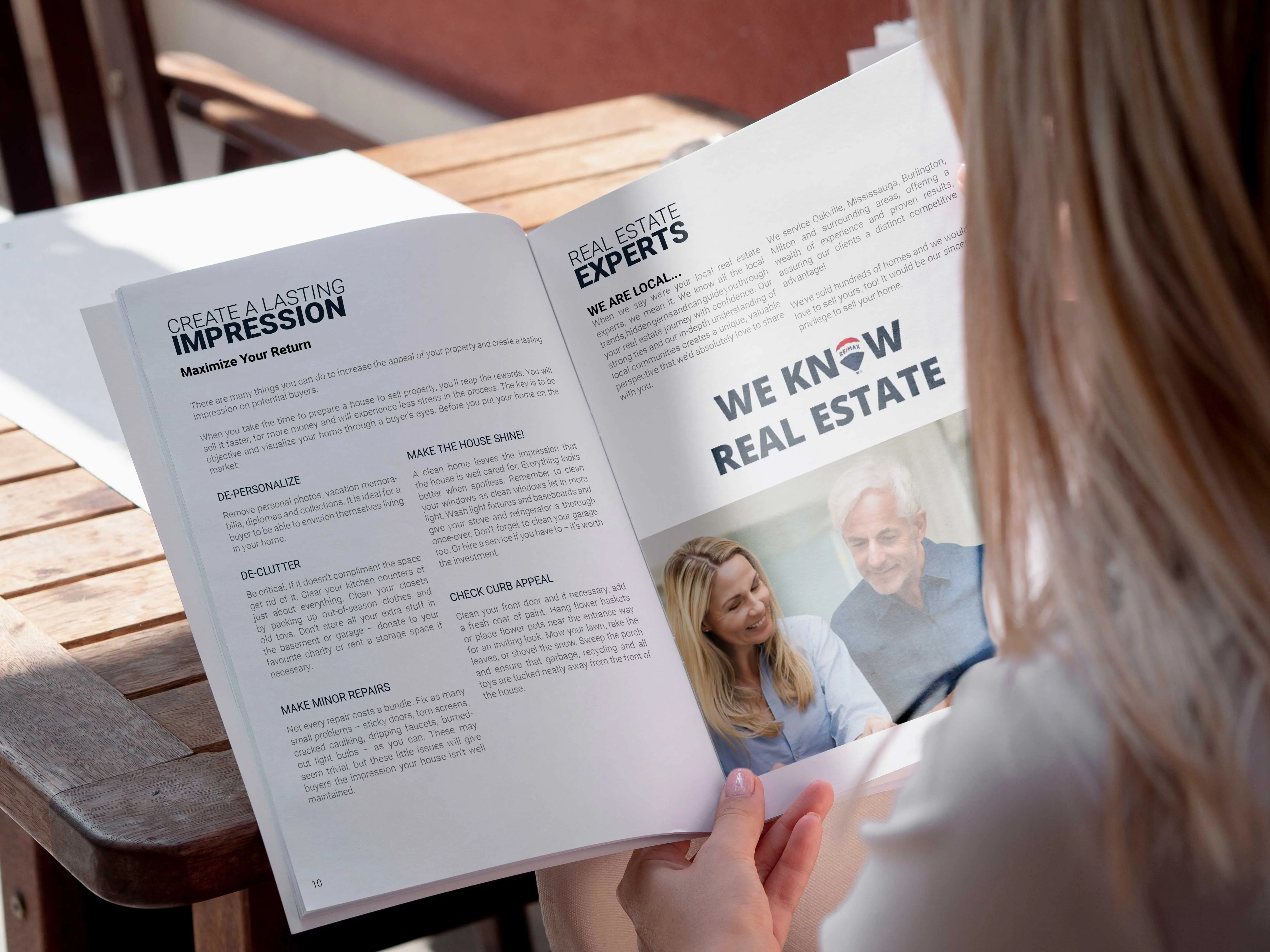 Blonde haired woman reading the sellers guide booklet.