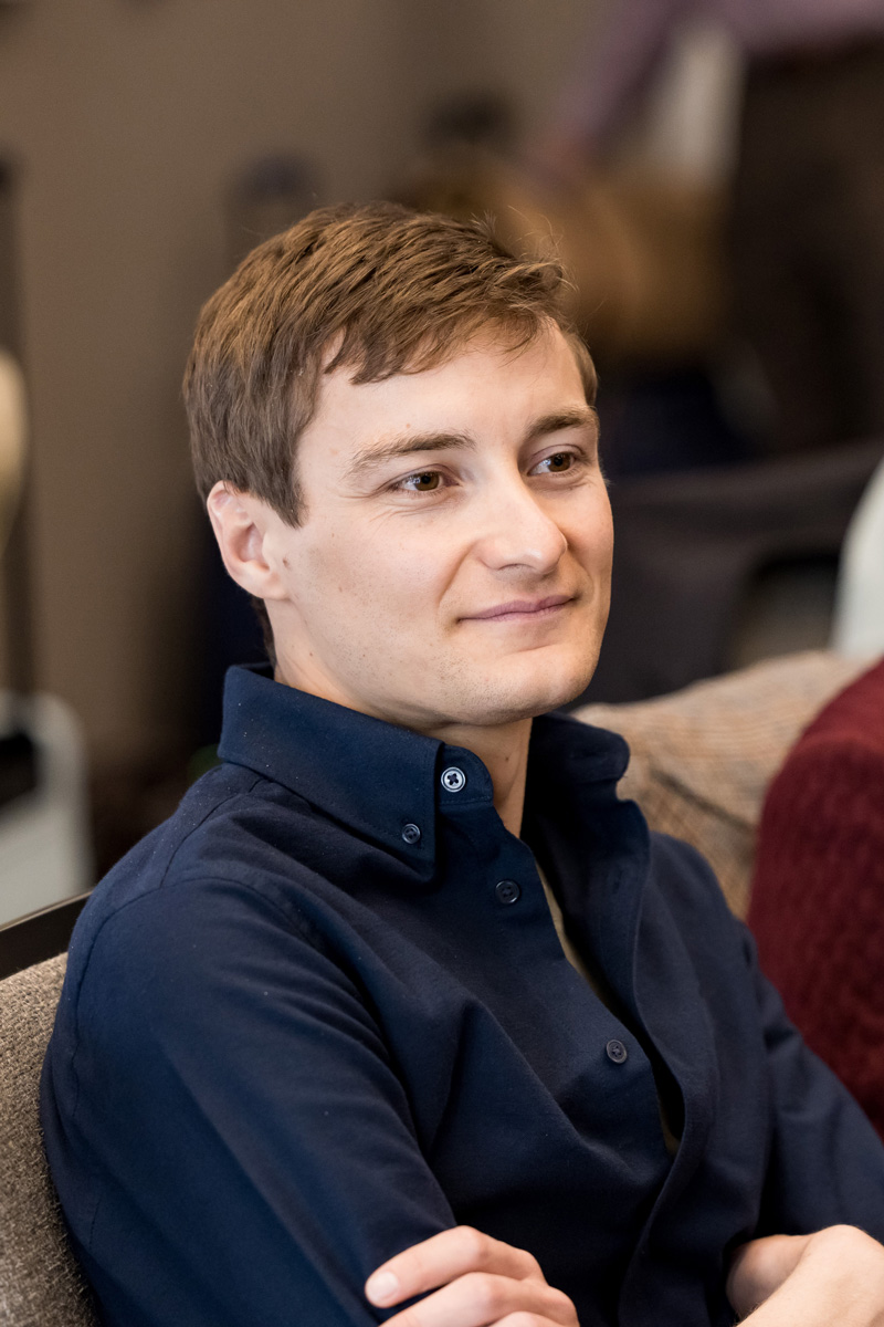 Oliver Ball smiles during a 2022 presentation with DHC