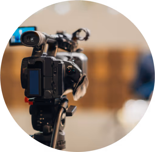 A digital camera and a soft focus background.