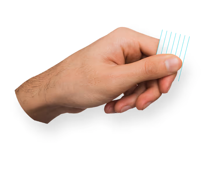 A hand holding a design element from the website