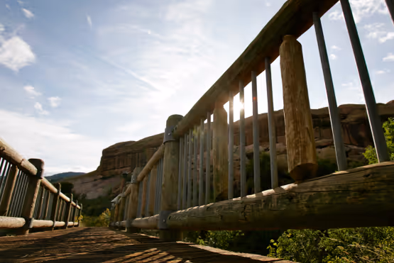 A rustic wooden bridge at Red Rocks