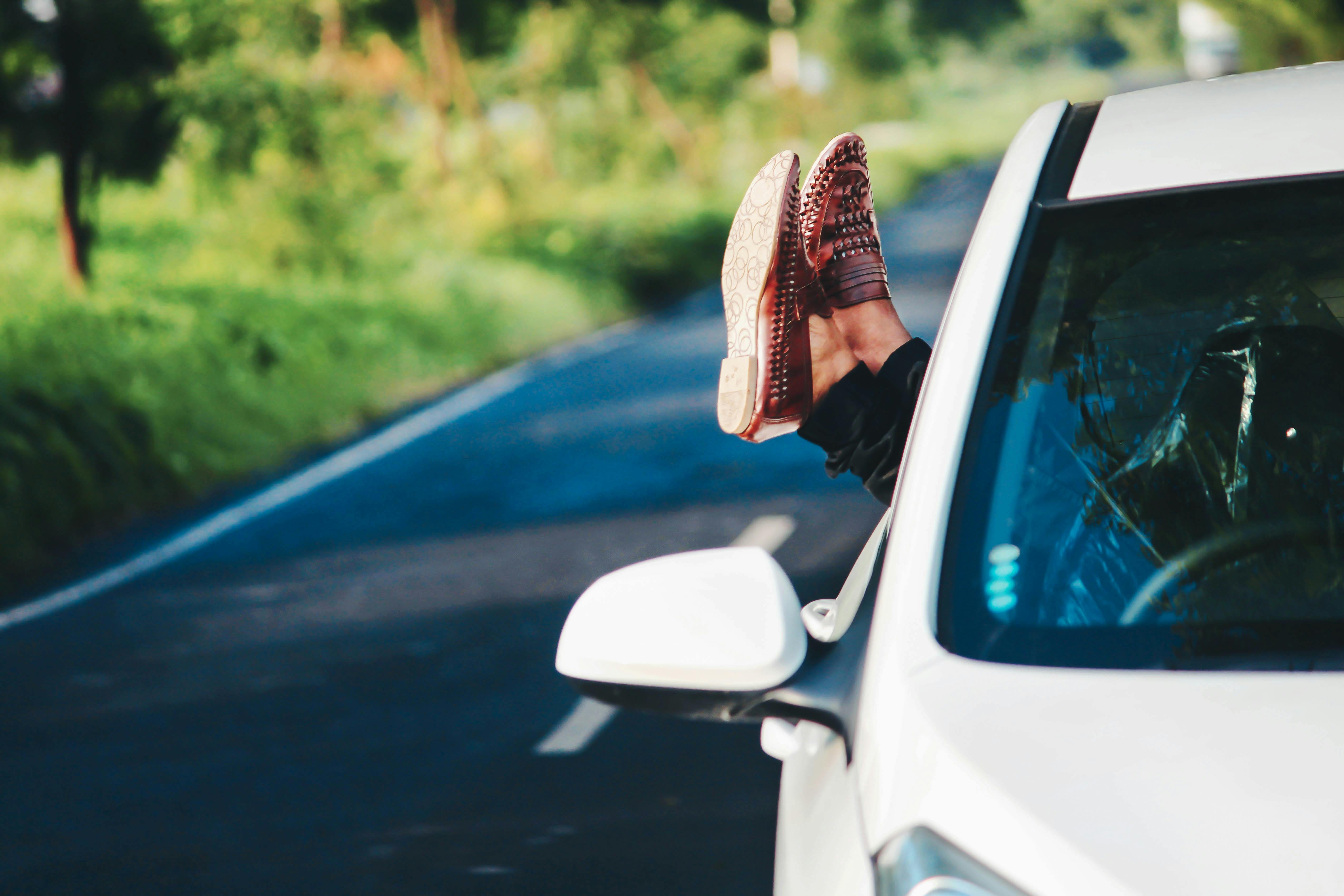 Feet Hanging Out Car Window