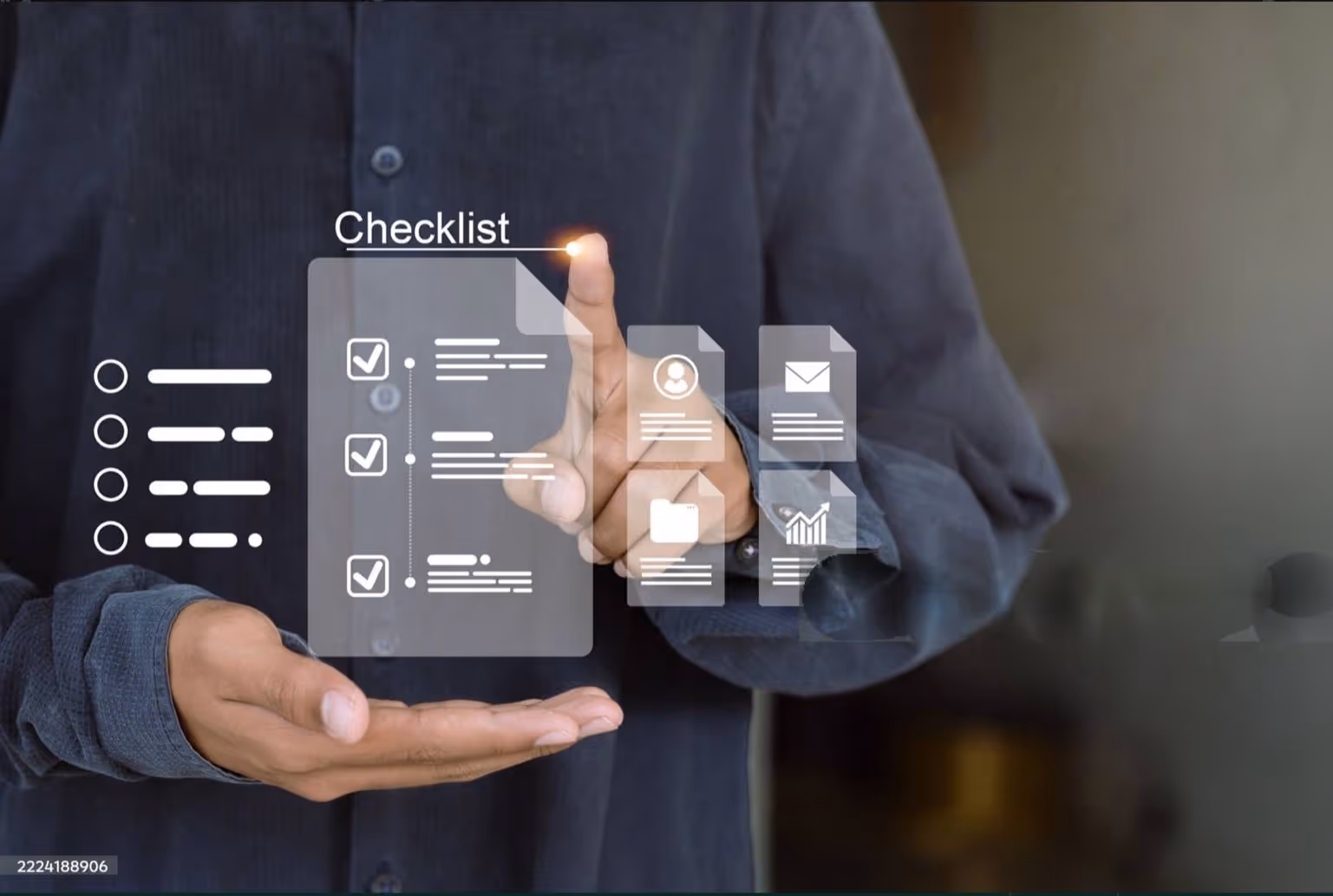 Person in a dark shirt interacting with a virtual checklist and document icons hologram.
