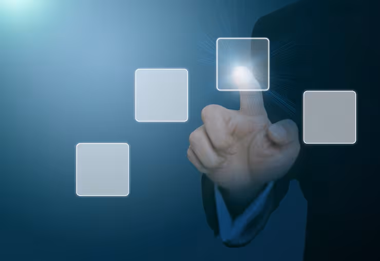 Person's hand pointing to a glowing square icon among four floating transparent squares on a dark blue background.