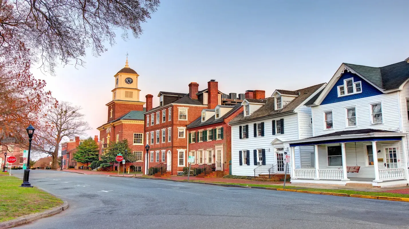 Photo of a historic street scene in Delaware with traditional homes and a clock tower, representing a key US market for homeowners to sell their house and access home equity