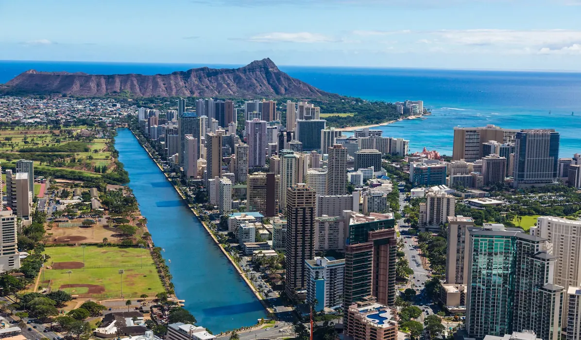 Aerial photo of the Honolulu, Hawaii, skyline and Diamond Head, representing a unique, high-value US market for homeowners to sell their house and access home equity
