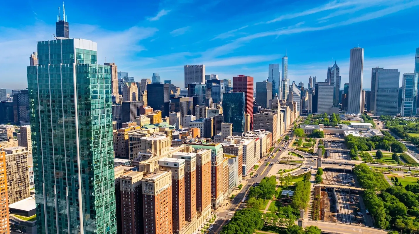 Photo of the vast Chicago, Illinois, city skyline, representing a key, high-volume US market for homeowners to sell their house and access home equity