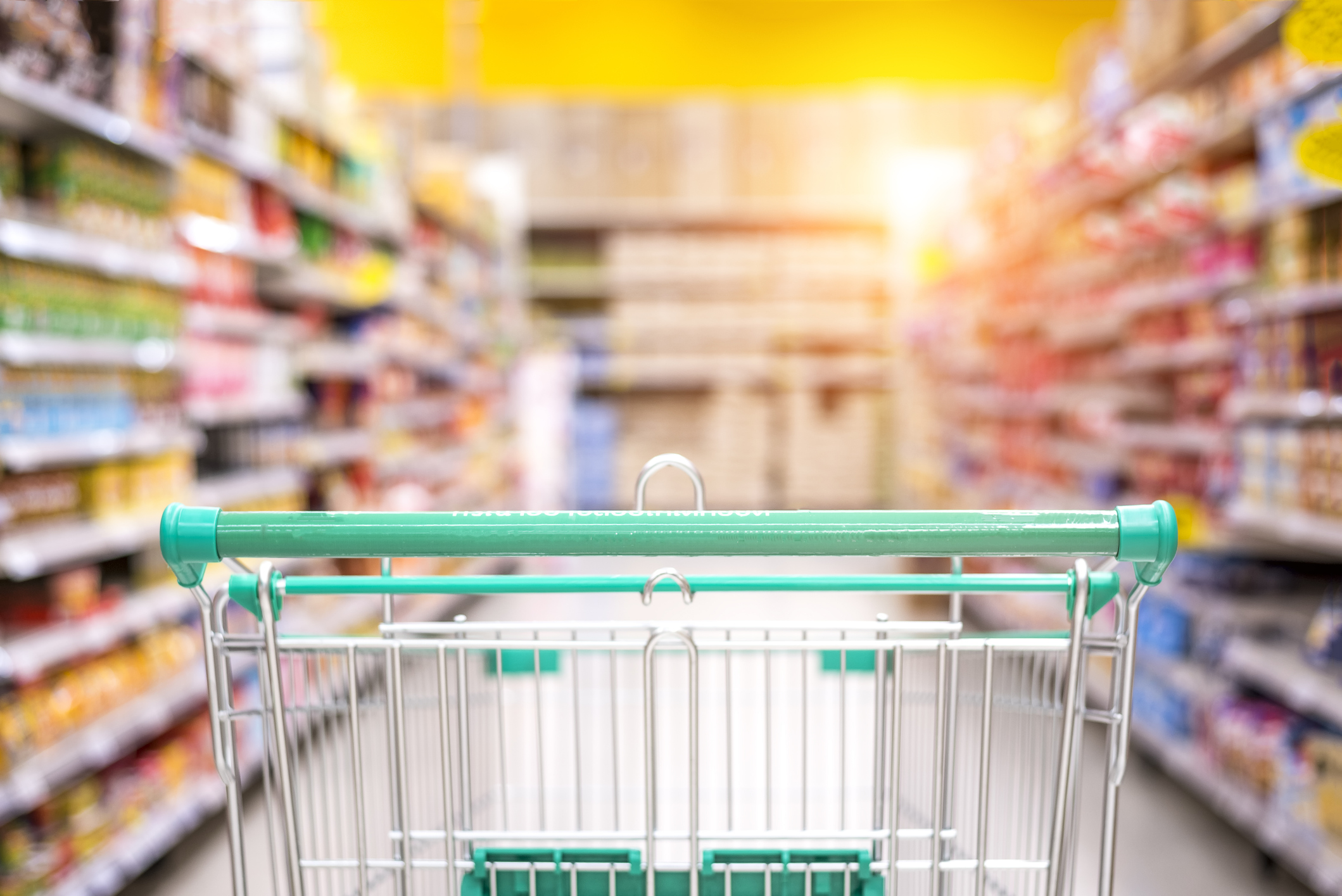 Shopping cart in store aisle