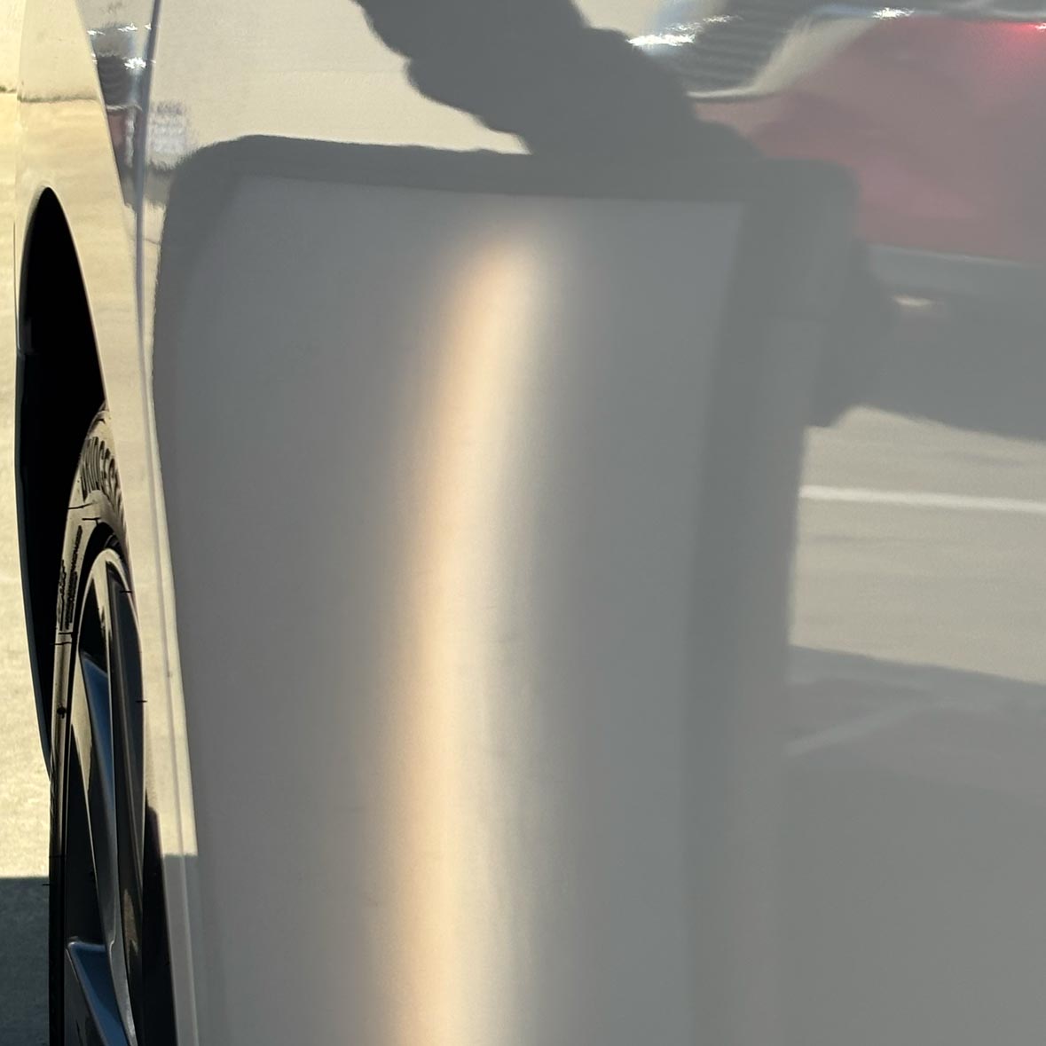 Mazda 3 driver's side rear door after paintless dent repair