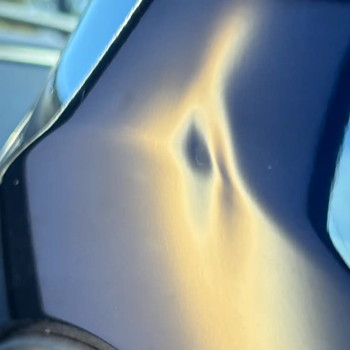Mazda CX-5 front fender dent before paintless dent repair