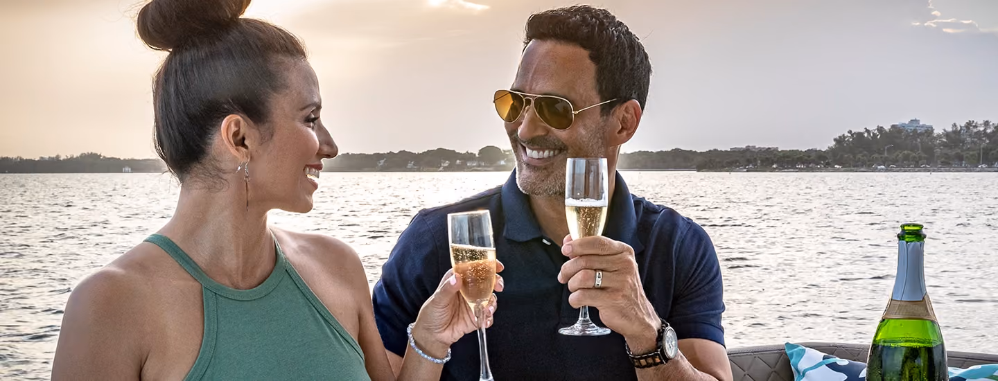 Couple celebrating on Galeon Yacht.