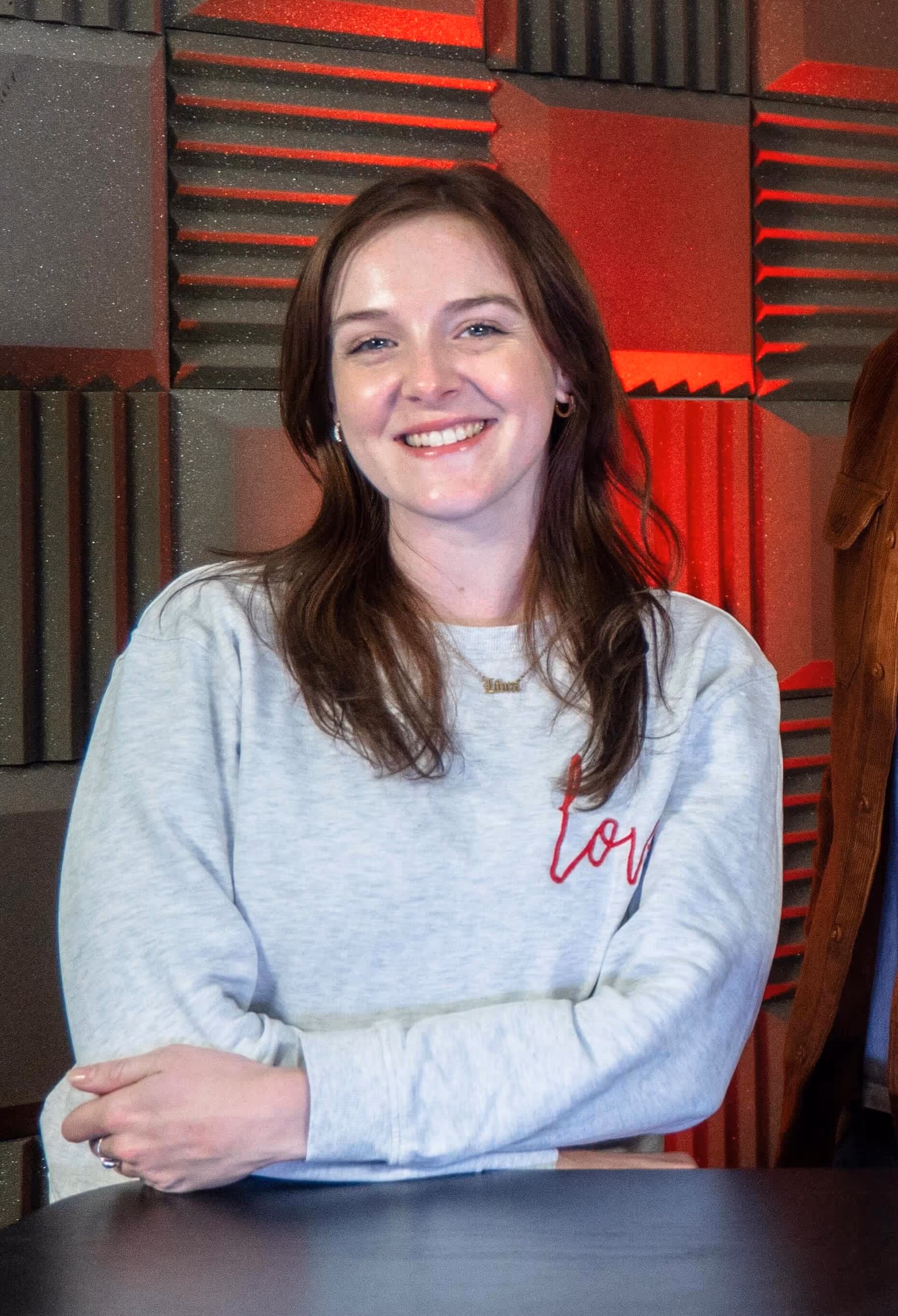 Radio.co team member, Amber Macdonald, posing for a picture.